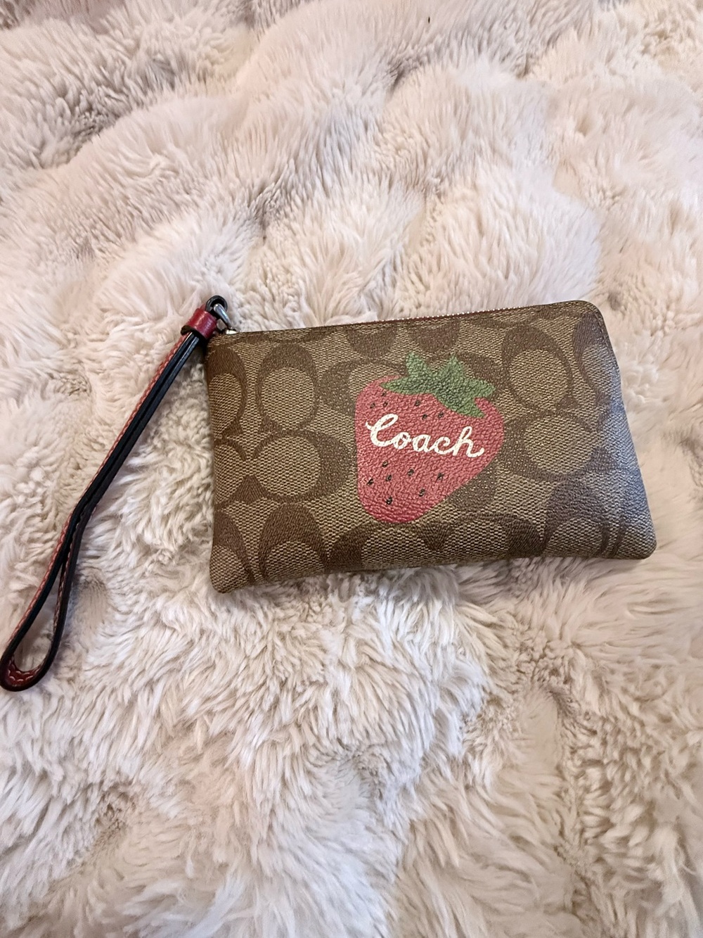 Coach Brown Signature Wristlet with Red Strawberry Graphic